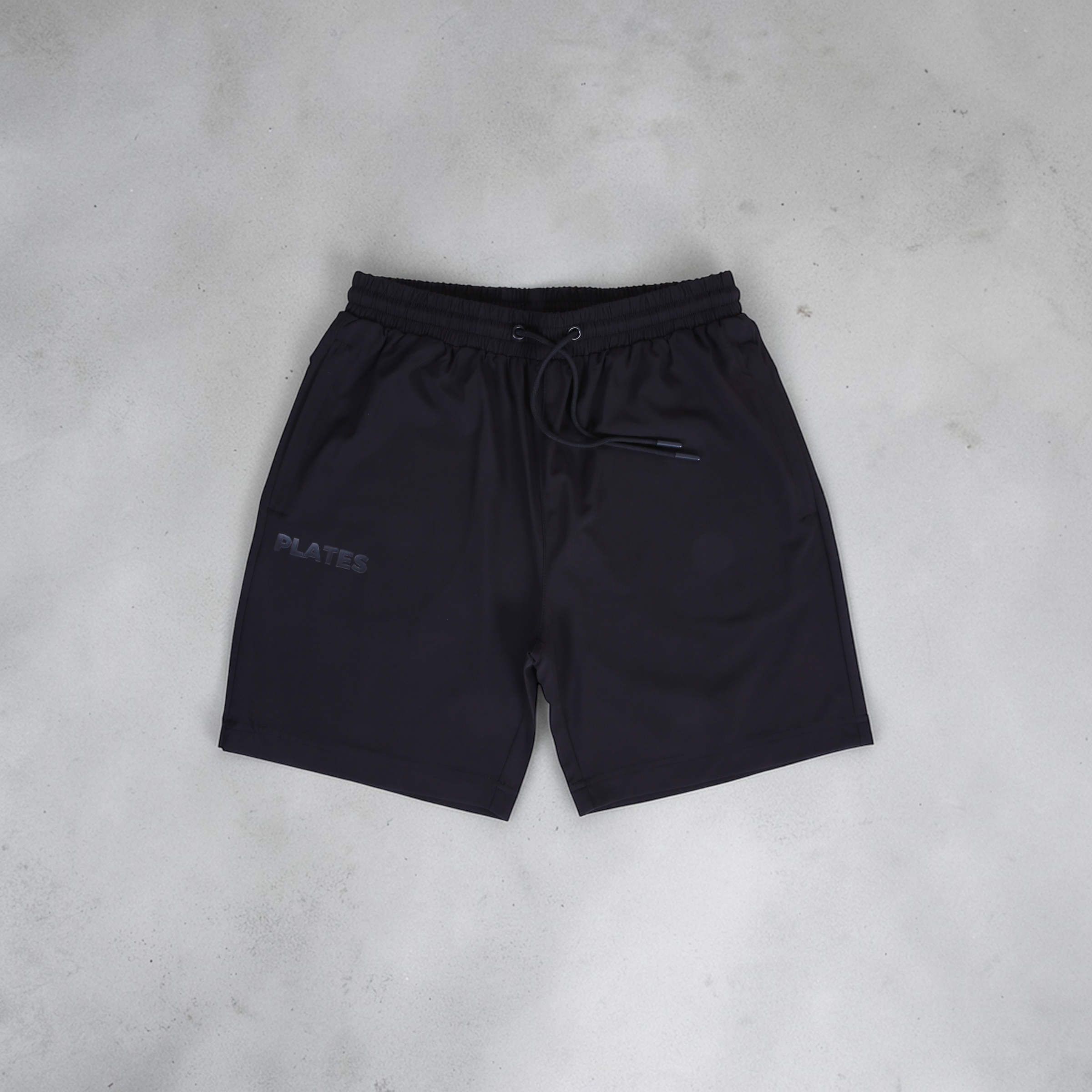 Plates Men’s 7" Performance Woven Shorts - Black